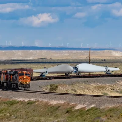 BNSF locomotive carrying windmill part